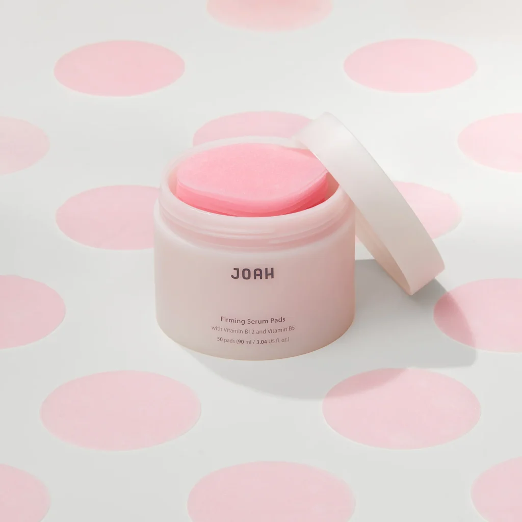 Open JOAH Firming Pads with Bakuchiol showing a pink firming pad